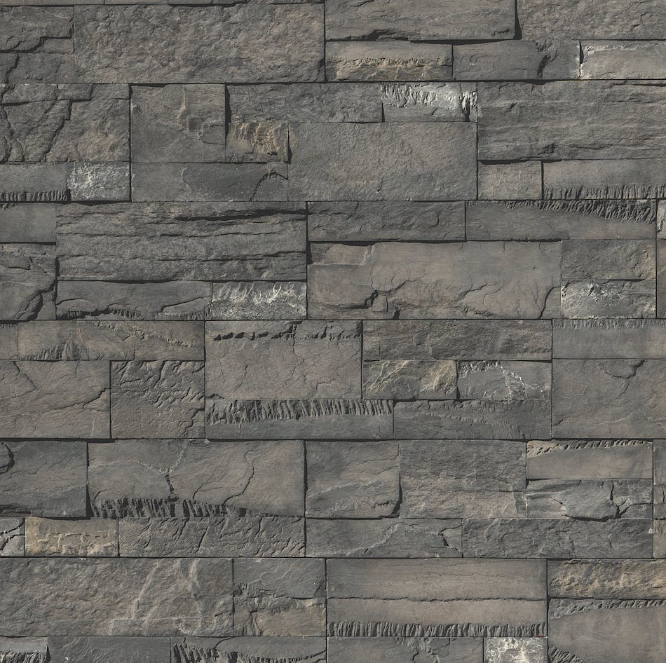 Wall made of stone veneer panels.