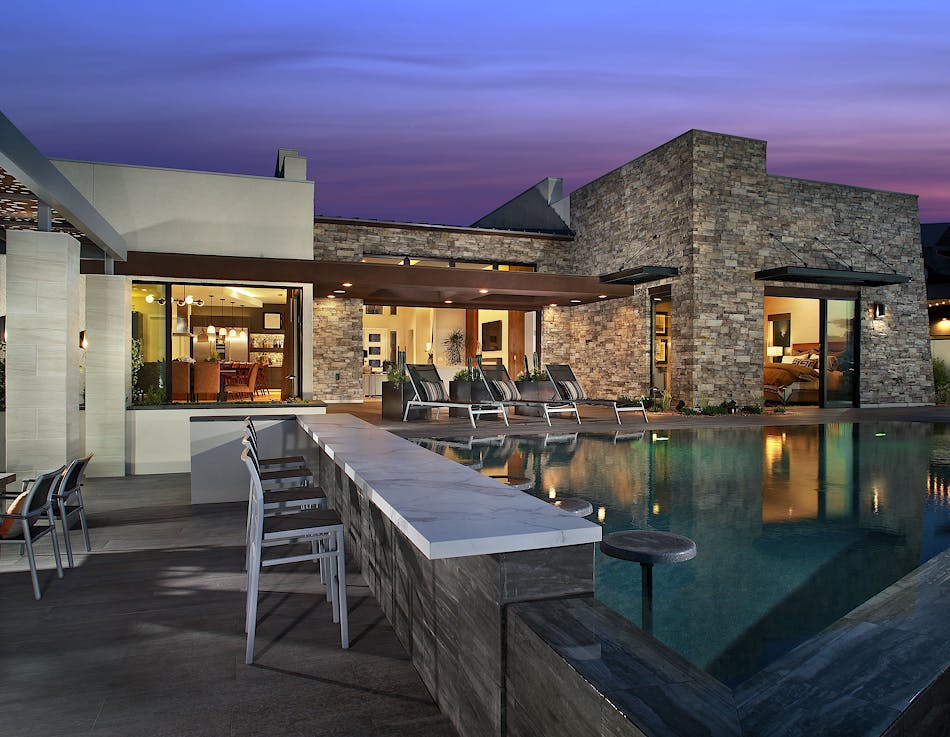 Outdoor Living environment with stone, pool and steel